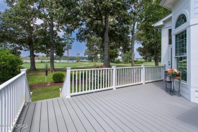 Beautiful sunset views over 17th hole, marina and Yeopim River on Sound Golf Links at Albemarle Plantation in North Carolina - for sale on GolfHomes.com, golf home, golf lot