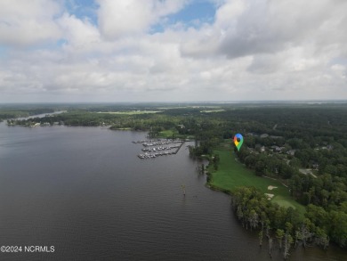 Beautiful sunset views over 17th hole, marina and Yeopim River on Sound Golf Links at Albemarle Plantation in North Carolina - for sale on GolfHomes.com, golf home, golf lot