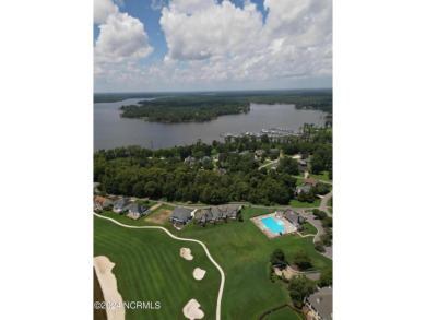 Beautiful sunset views over 17th hole, marina and Yeopim River on Sound Golf Links at Albemarle Plantation in North Carolina - for sale on GolfHomes.com, golf home, golf lot