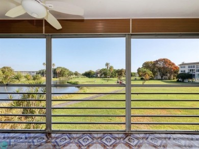 BRAND NEW VINYL FLOORING, NEVER-USED TOP-LINE SS APPLIANCES W/ on Wynmoor Golf Course in Florida - for sale on GolfHomes.com, golf home, golf lot