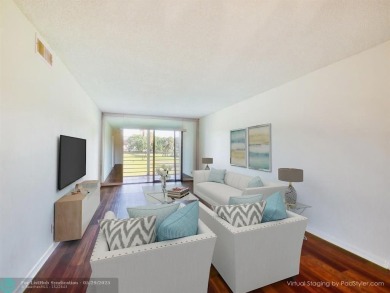 BRAND NEW VINYL FLOORING, NEVER-USED TOP-LINE SS APPLIANCES W/ on Wynmoor Golf Course in Florida - for sale on GolfHomes.com, golf home, golf lot