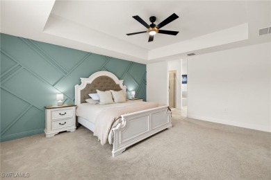 This beautifully designed four-bedroom home offers an on Palmetto-Pine Country Club in Florida - for sale on GolfHomes.com, golf home, golf lot