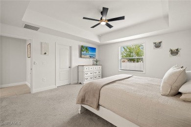 This beautifully designed four-bedroom home offers an on Palmetto-Pine Country Club in Florida - for sale on GolfHomes.com, golf home, golf lot