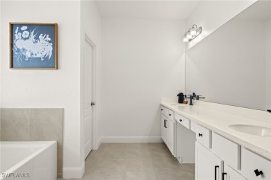 This beautifully designed four-bedroom home offers an on Palmetto-Pine Country Club in Florida - for sale on GolfHomes.com, golf home, golf lot