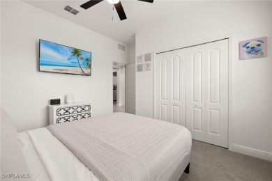 This beautifully designed four-bedroom home offers an on Palmetto-Pine Country Club in Florida - for sale on GolfHomes.com, golf home, golf lot