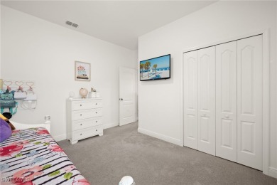 This beautifully designed four-bedroom home offers an on Palmetto-Pine Country Club in Florida - for sale on GolfHomes.com, golf home, golf lot