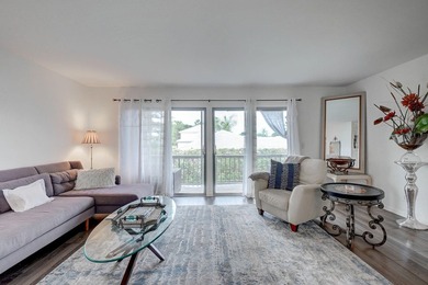 Premium Views of the 6th hole from two levels. Popular townhome on Riverbend Golf Club in Florida - for sale on GolfHomes.com, golf home, golf lot