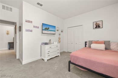 This beautifully designed four-bedroom home offers an on Palmetto-Pine Country Club in Florida - for sale on GolfHomes.com, golf home, golf lot