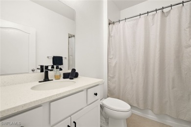 This beautifully designed four-bedroom home offers an on Palmetto-Pine Country Club in Florida - for sale on GolfHomes.com, golf home, golf lot