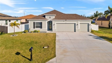 This beautifully designed four-bedroom home offers an on Palmetto-Pine Country Club in Florida - for sale on GolfHomes.com, golf home, golf lot