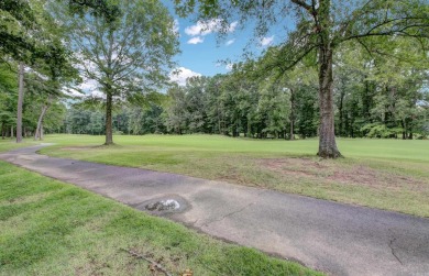 Classic and stately Chenal home with its brick and stone on Chenal Country Club - Bear Den Mountain in Arkansas - for sale on GolfHomes.com, golf home, golf lot