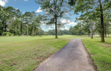 Classic and stately Chenal home with its brick and stone on Chenal Country Club - Bear Den Mountain in Arkansas - for sale on GolfHomes.com, golf home, golf lot