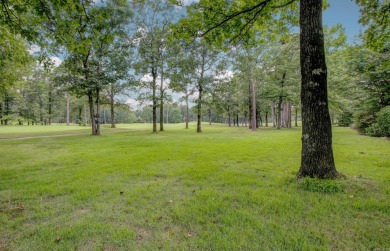 Classic and stately Chenal home with its brick and stone on Chenal Country Club - Bear Den Mountain in Arkansas - for sale on GolfHomes.com, golf home, golf lot