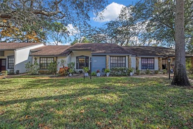 Beautifully maintained 2-bedroom, 2-bath villa featuring tile on Timber Pines Golf Course in Florida - for sale on GolfHomes.com, golf home, golf lot