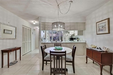 Beautifully maintained 2-bedroom, 2-bath villa featuring tile on Timber Pines Golf Course in Florida - for sale on GolfHomes.com, golf home, golf lot