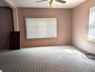 Charming Home Just 15 Minutes from Traverse City!  This on Interlochen Golf and Country Club in Michigan - for sale on GolfHomes.com, golf home, golf lot