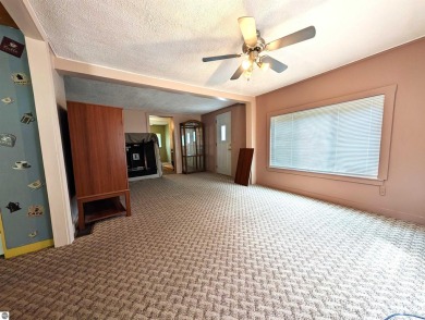 Charming Home Just 15 Minutes from Traverse City!  This on Interlochen Golf and Country Club in Michigan - for sale on GolfHomes.com, golf home, golf lot