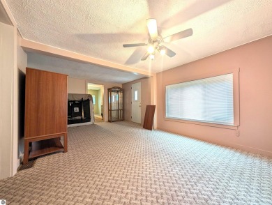 Charming Home Just 15 Minutes from Traverse City!  This on Interlochen Golf and Country Club in Michigan - for sale on GolfHomes.com, golf home, golf lot