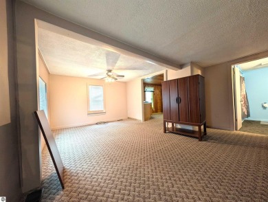 Charming Home Just 15 Minutes from Traverse City!  This on Interlochen Golf and Country Club in Michigan - for sale on GolfHomes.com, golf home, golf lot