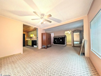 Charming Home Just 15 Minutes from Traverse City!  This on Interlochen Golf and Country Club in Michigan - for sale on GolfHomes.com, golf home, golf lot