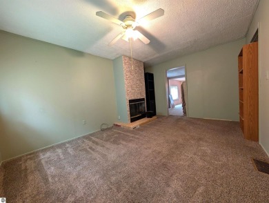 Charming Home Just 15 Minutes from Traverse City!  This on Interlochen Golf and Country Club in Michigan - for sale on GolfHomes.com, golf home, golf lot