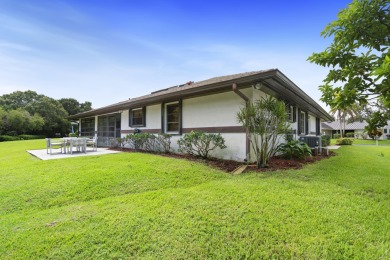 Charming CBS home in Country Club Cove, a quiet community of on Miles Grant Country Club in Florida - for sale on GolfHomes.com, golf home, golf lot