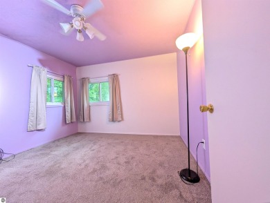 Charming Home Just 15 Minutes from Traverse City!  This on Interlochen Golf and Country Club in Michigan - for sale on GolfHomes.com, golf home, golf lot
