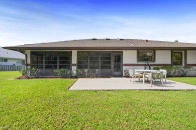Charming CBS home in Country Club Cove, a quiet community of on Miles Grant Country Club in Florida - for sale on GolfHomes.com, golf home, golf lot