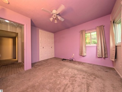 Charming Home Just 15 Minutes from Traverse City!  This on Interlochen Golf and Country Club in Michigan - for sale on GolfHomes.com, golf home, golf lot