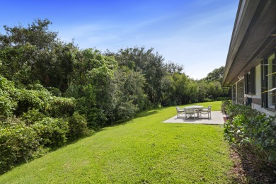 Charming CBS home in Country Club Cove, a quiet community of on Miles Grant Country Club in Florida - for sale on GolfHomes.com, golf home, golf lot