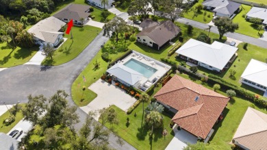 Charming CBS home in Country Club Cove, a quiet community of on Miles Grant Country Club in Florida - for sale on GolfHomes.com, golf home, golf lot