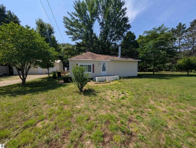Charming Home Just 15 Minutes from Traverse City!  This on Interlochen Golf and Country Club in Michigan - for sale on GolfHomes.com, golf home, golf lot