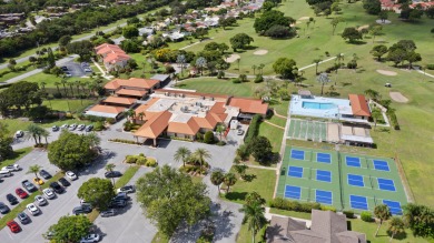 Charming CBS home in Country Club Cove, a quiet community of on Miles Grant Country Club in Florida - for sale on GolfHomes.com, golf home, golf lot