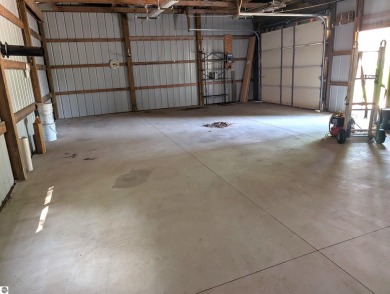 Charming Home Just 15 Minutes from Traverse City!  This on Interlochen Golf and Country Club in Michigan - for sale on GolfHomes.com, golf home, golf lot