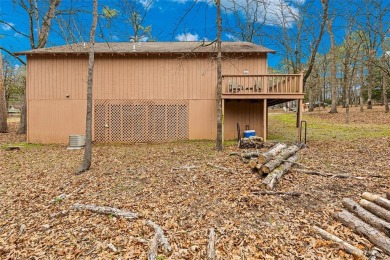 Enjoy this darling 2 bedroom & 2 bath home on two lots with two on Holly Lake Ranch Golf Club in Texas - for sale on GolfHomes.com, golf home, golf lot