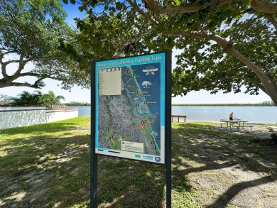 Charming CBS home in Country Club Cove, a quiet community of on Miles Grant Country Club in Florida - for sale on GolfHomes.com, golf home, golf lot