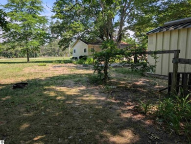 Charming Home Just 15 Minutes from Traverse City!  This on Interlochen Golf and Country Club in Michigan - for sale on GolfHomes.com, golf home, golf lot