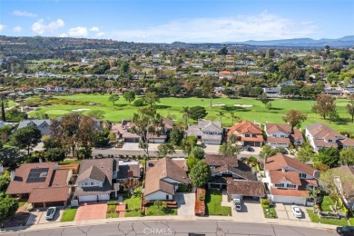 Welcome to this exquisitely remodeled single-level home nestled on El Niguel Country Club in California - for sale on GolfHomes.com, golf home, golf lot