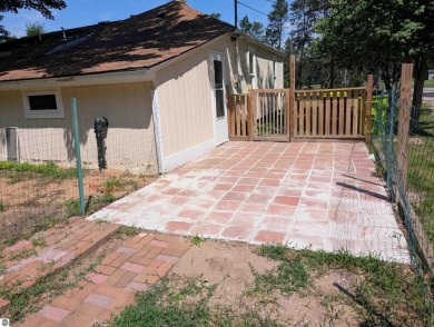 Charming Home Just 15 Minutes from Traverse City!  This on Interlochen Golf and Country Club in Michigan - for sale on GolfHomes.com, golf home, golf lot