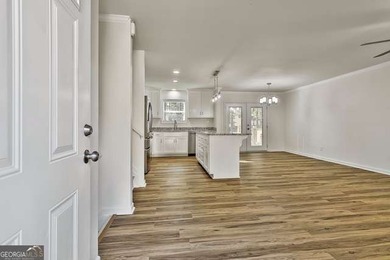 Completely renovated and truly move-in ready, this charming home on Canongate On White Oak Golf Course in Georgia - for sale on GolfHomes.com, golf home, golf lot