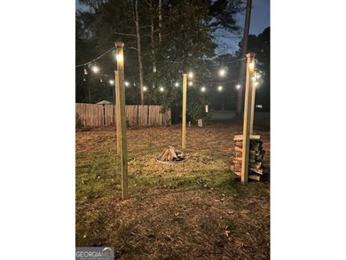 Completely renovated and truly move-in ready, this charming home on Canongate On White Oak Golf Course in Georgia - for sale on GolfHomes.com, golf home, golf lot