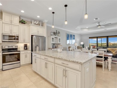 Welcome to The Gulf Life! This stunning coach home is located on Esplanade Golf and  Country Club in Florida - for sale on GolfHomes.com, golf home, golf lot