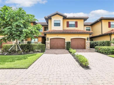 Welcome to The Gulf Life! This stunning coach home is located on Esplanade Golf and  Country Club in Florida - for sale on GolfHomes.com, golf home, golf lot