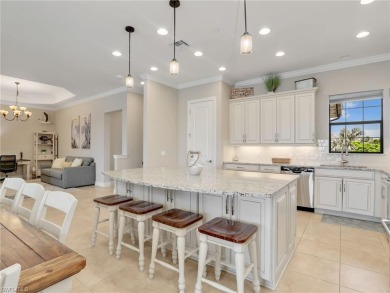 Welcome to The Gulf Life! This stunning coach home is located on Esplanade Golf and  Country Club in Florida - for sale on GolfHomes.com, golf home, golf lot