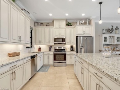 Welcome to The Gulf Life! This stunning coach home is located on Esplanade Golf and  Country Club in Florida - for sale on GolfHomes.com, golf home, golf lot