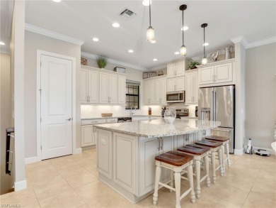 Welcome to The Gulf Life! This stunning coach home is located on Esplanade Golf and  Country Club in Florida - for sale on GolfHomes.com, golf home, golf lot