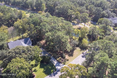 Build your coastal retreat on this .33-acre waterfront lot in on Lockwood Folly Country Club in North Carolina - for sale on GolfHomes.com, golf home, golf lot