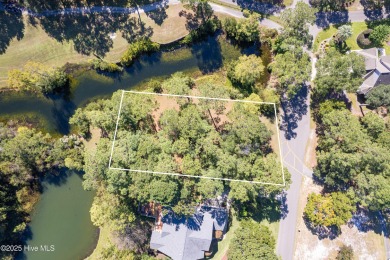 Build your coastal retreat on this .33-acre waterfront lot in on Lockwood Folly Country Club in North Carolina - for sale on GolfHomes.com, golf home, golf lot