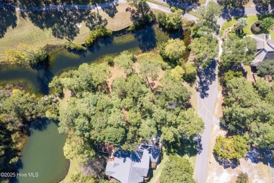 Build your coastal retreat on this .33-acre waterfront lot in on Lockwood Folly Country Club in North Carolina - for sale on GolfHomes.com, golf home, golf lot