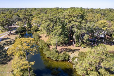Build your coastal retreat on this .33-acre waterfront lot in on Lockwood Folly Country Club in North Carolina - for sale on GolfHomes.com, golf home, golf lot